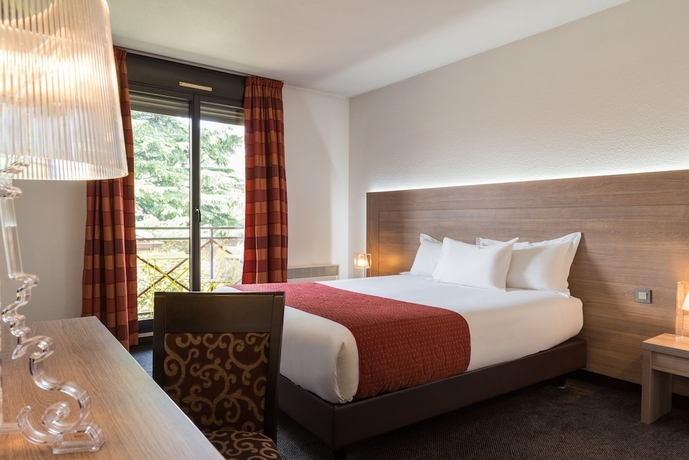 Imagen de la habitación del Hotel Les Amandiers. Foto 7