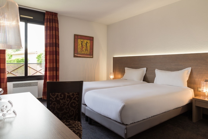 Imagen de la habitación del Hotel Les Amandiers. Foto 9