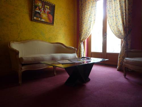 Imagen de la habitación del Hotel Les Arcades Le Lion D'or. Foto 14