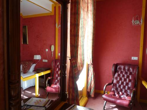 Imagen de la habitación del Hotel Les Arcades Le Lion D'or. Foto 16