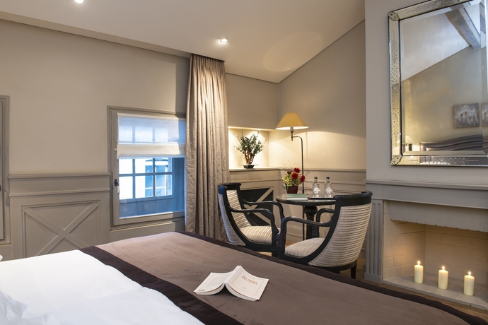 Imagen de la habitación del Hotel Les Armures. Foto 15