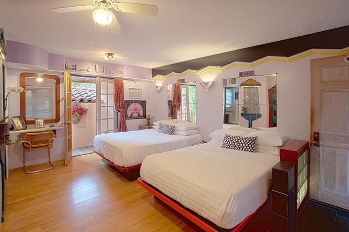 Imagen de la habitación del Hotel Les Artistes Inn. Foto 4