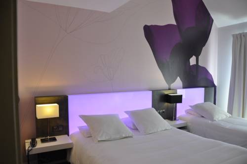 Imagen de la habitación del Hotel Les Ast&eacute;ries. Foto 2
