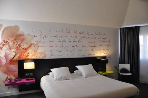 Imagen de la habitación del Hotel Les Ast&eacute;ries. Foto 11