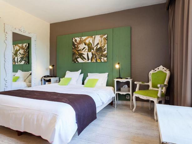 Imagen de la habitación del Hotel Les Aubuns Country. Foto 3