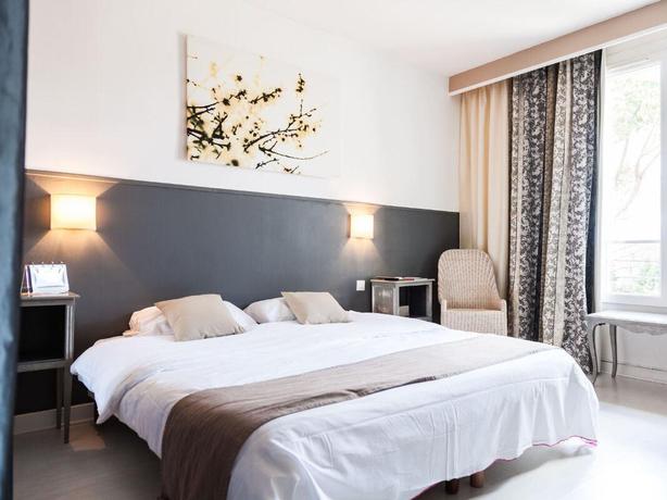 Imagen de la habitación del Hotel Les Aubuns Country. Foto 4