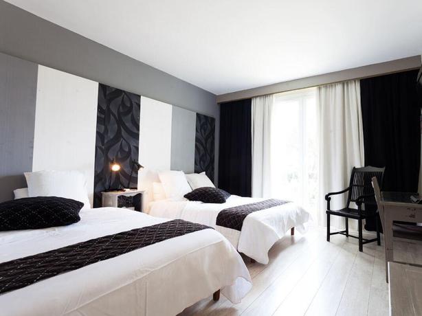 Imagen de la habitación del Hotel Les Aubuns Country. Foto 5