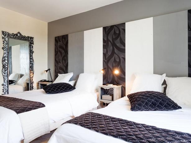 Imagen de la habitación del Hotel Les Aubuns Country. Foto 6