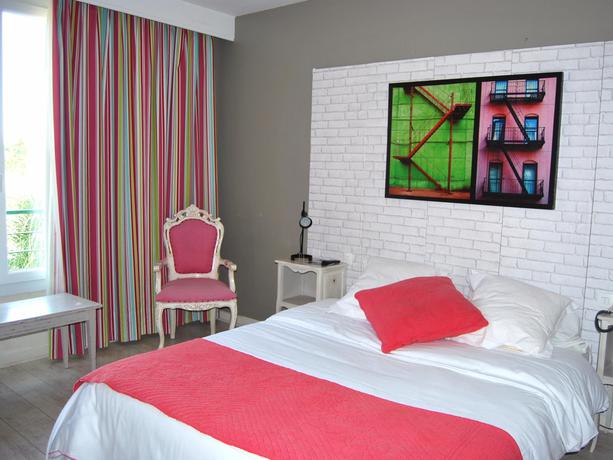 Imagen de la habitación del Hotel Les Aubuns Country. Foto 7