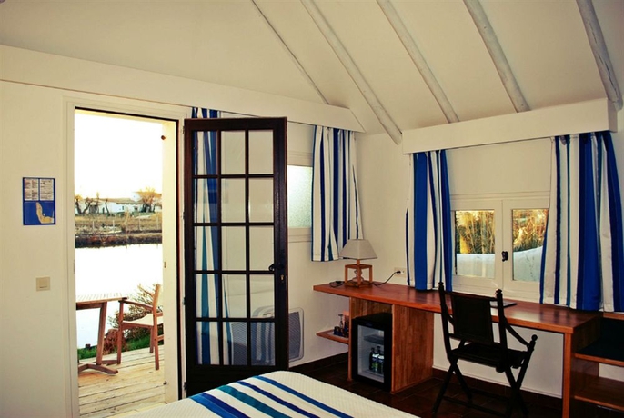 Imagen de la habitación del Hotel Les Bains Gardians. Foto 13