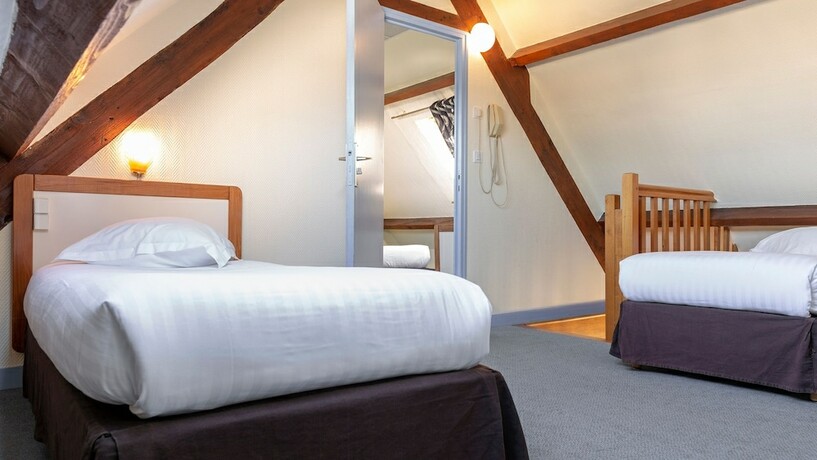 Imagen de la habitación del Hotel Les Bains de Mer. Foto 13