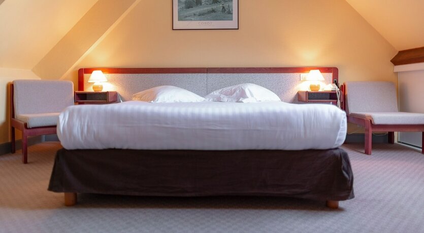 Imagen de la habitación del Hotel Les Bains de Mer. Foto 16