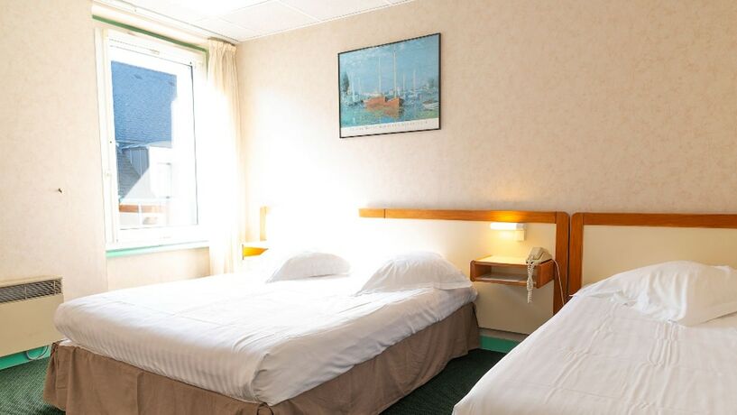 Imagen de la habitación del Hotel Les Bains de Mer. Foto 18