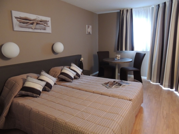 Imagen de la habitación del Hotel Les Baladines Residence Tourisme. Foto 11