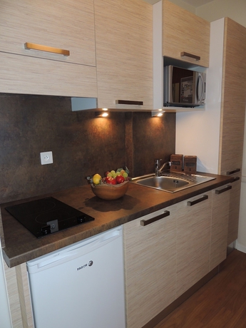 Imagen de la habitación del Hotel Les Baladines Residence Tourisme. Foto 16
