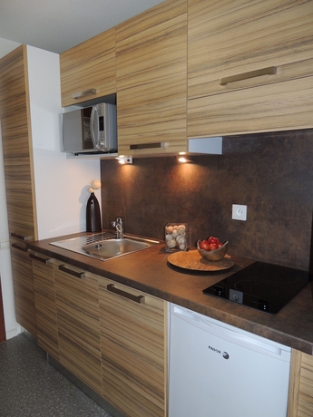 Imagen de la habitación del Hotel Les Baladines Residence Tourisme. Foto 17