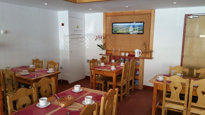 Imagen del bar/restaurante del Hotel Les Balcons Du Soleil. Foto 4