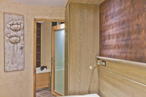 Imagen de la habitación del Hotel Les Balcons Platinium. Foto 15