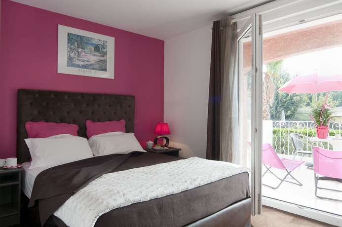 Imagen de la habitación del Hotel Les Bastides St Paul. Foto 3