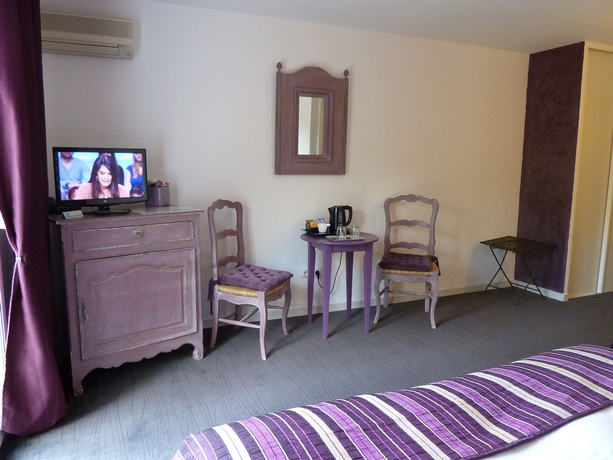 Imagen de la habitación del Hotel Les Bastides St Paul. Foto 4