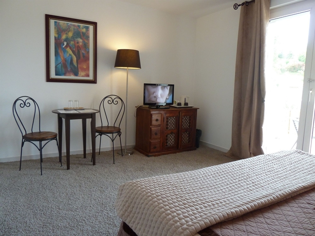 Imagen de la habitación del Hotel Les Bastides St Paul. Foto 6