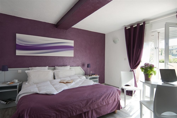 Imagen de la habitación del Hotel Les Bastides St Paul. Foto 13