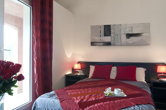 Imagen de la habitación del Hotel Les Bastides St Paul. Foto 14