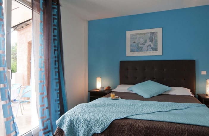 Imagen de la habitación del Hotel Les Bastides St Paul. Foto 15