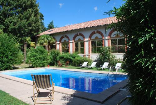 Imagen de la habitación del Hotel Les Bellugues. Foto 6