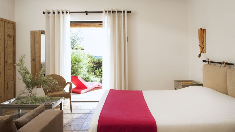 Imagen de la habitación del Hotel Les Bergeries De Palombaggia. Foto 2