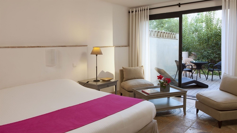 Imagen de la habitación del Hotel Les Bergeries De Palombaggia. Foto 8