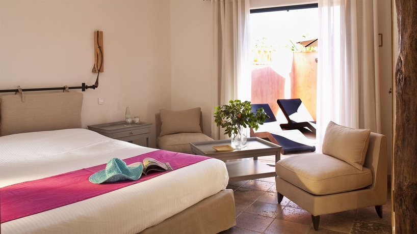 Imagen de la habitación del Hotel Les Bergeries De Palombaggia. Foto 9