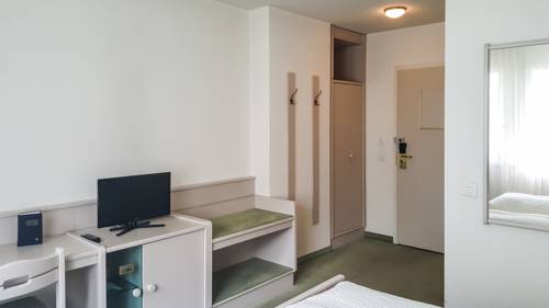 Imagen de la habitación del Hotel Les Berges. Foto 14