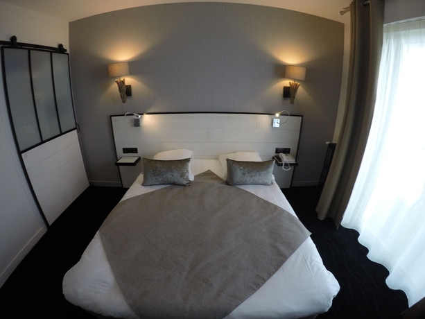 Imagen de la habitación del Hotel Les Brises. Foto 13