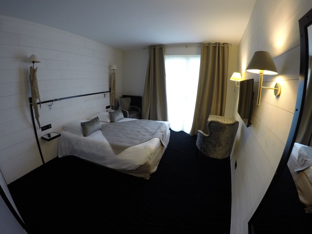 Imagen de la habitación del Hotel Les Brises. Foto 14