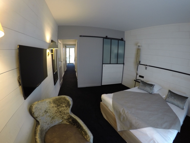 Imagen de la habitación del Hotel Les Brises. Foto 16