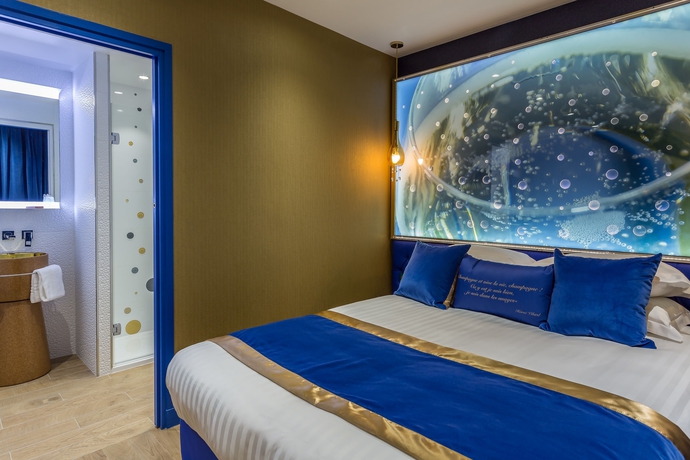 Imagen de la habitación del Hotel Les Bulles de Paris. Foto 4