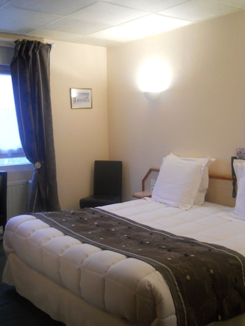 Imagen de la habitación del Hotel Les Camélias. Foto 10