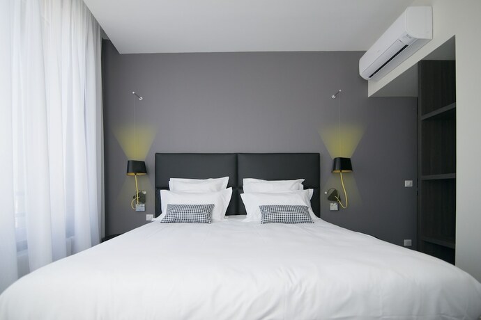 Imagen de la habitación del Hotel Les Capucins. Foto 11