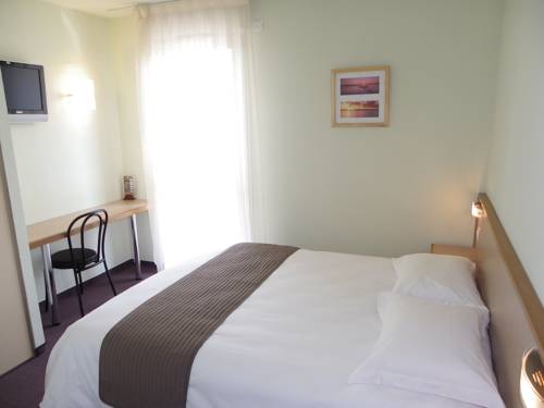 Imagen de la habitación del Hotel Les Ch&acirc;taigniers. Foto 16