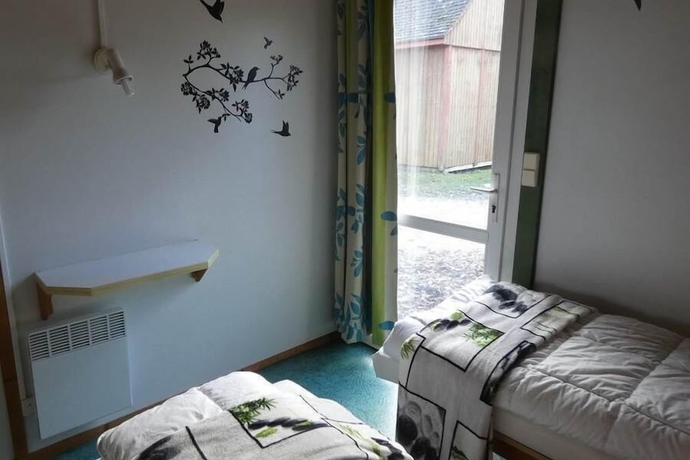 Imagen de la habitación del Hotel Les Chalets d\'Argentouleau. Foto 6