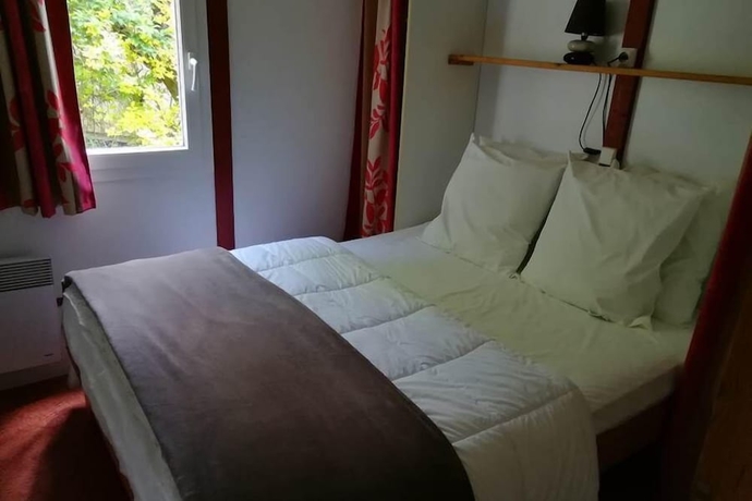 Imagen de la habitación del Hotel Les Chalets d\'Argentouleau. Foto 15