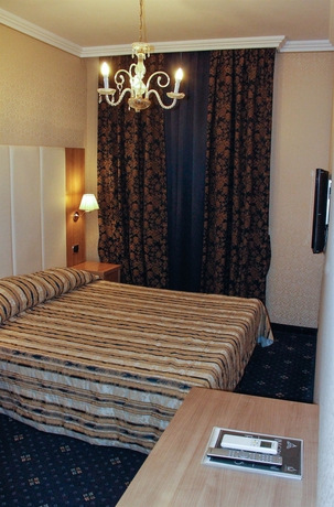 Imagen de la habitación del Hotel Les Chambres D' Or. Foto 9