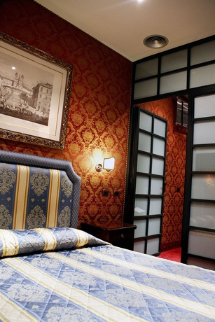 Imagen de la habitación del Hotel Les Chambres D' Or. Foto 12