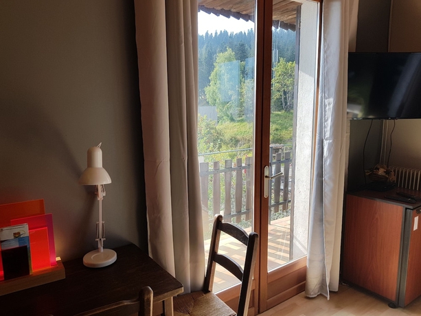 Imagen de la habitación del Hotel Les Chamois. Foto 9