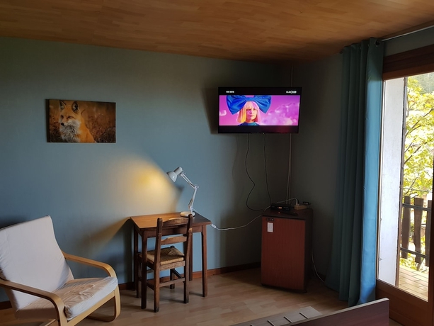 Imagen de la habitación del Hotel Les Chamois. Foto 12