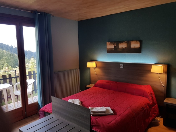 Imagen de la habitación del Hotel Les Chamois. Foto 14