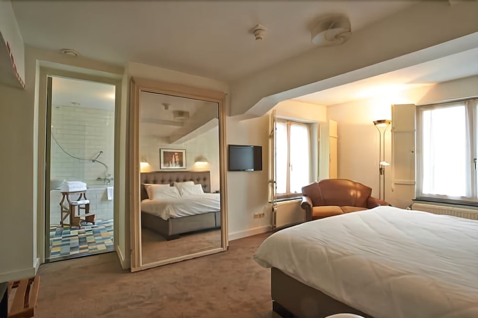 Imagen de la habitación del Hotel Les Charmes. Foto 7