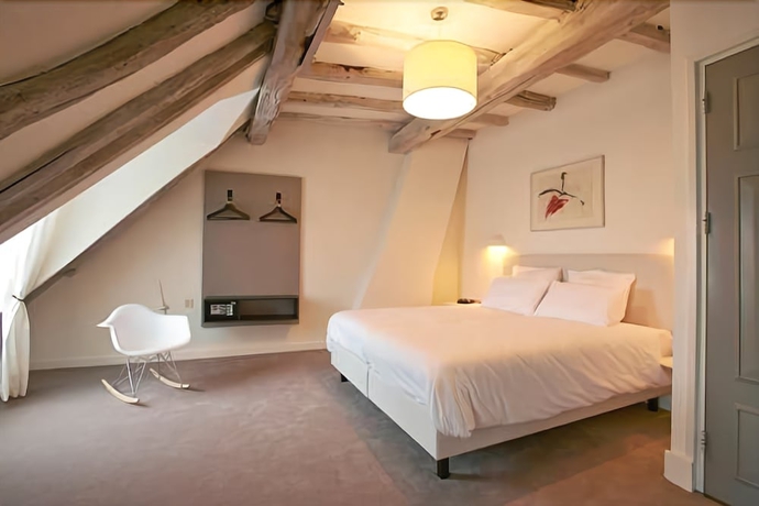 Imagen de la habitación del Hotel Les Charmes. Foto 8