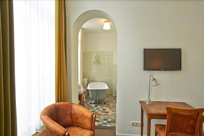 Imagen de la habitación del Hotel Les Charmes. Foto 13